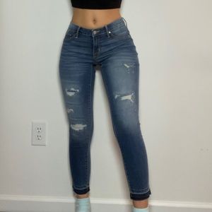 Mid Rise Distressed Skinny Jean